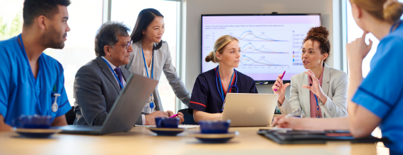 Women in a professional setting representing care and community